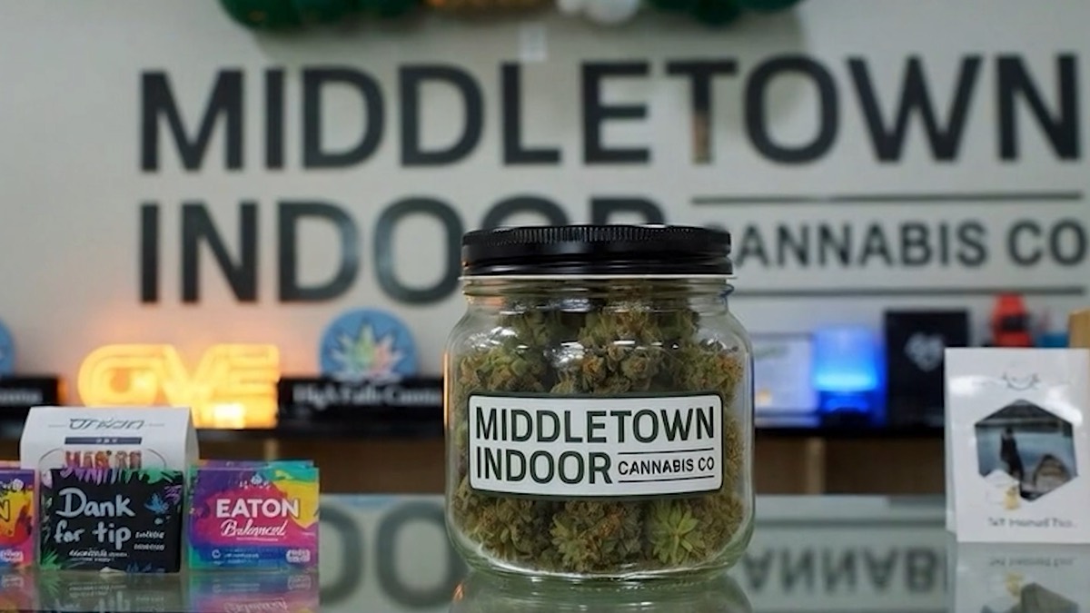 A labeled Middletown Indoor jar of flower on the counter.